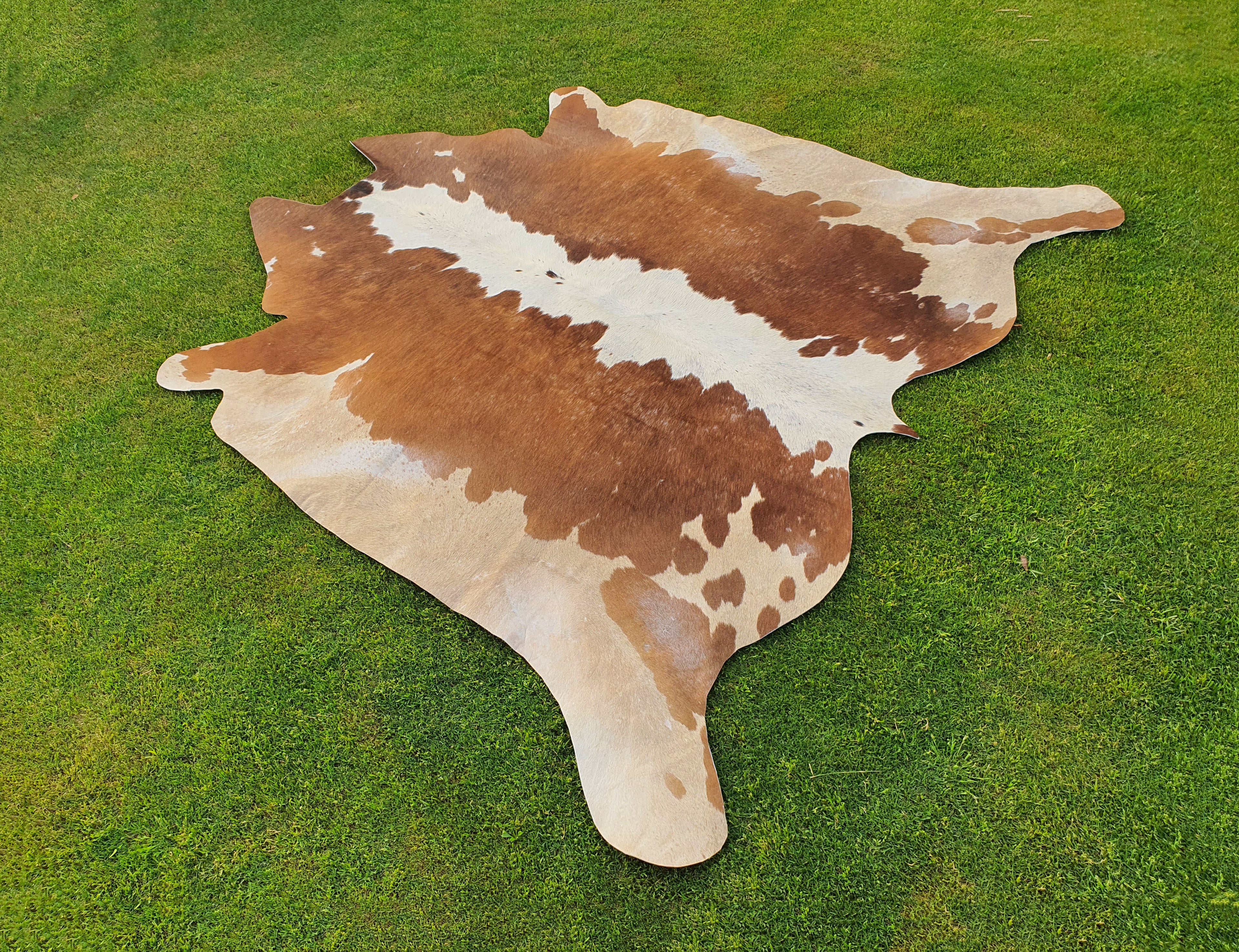 Brown and White Unique Print Hereford Cowhide Rug