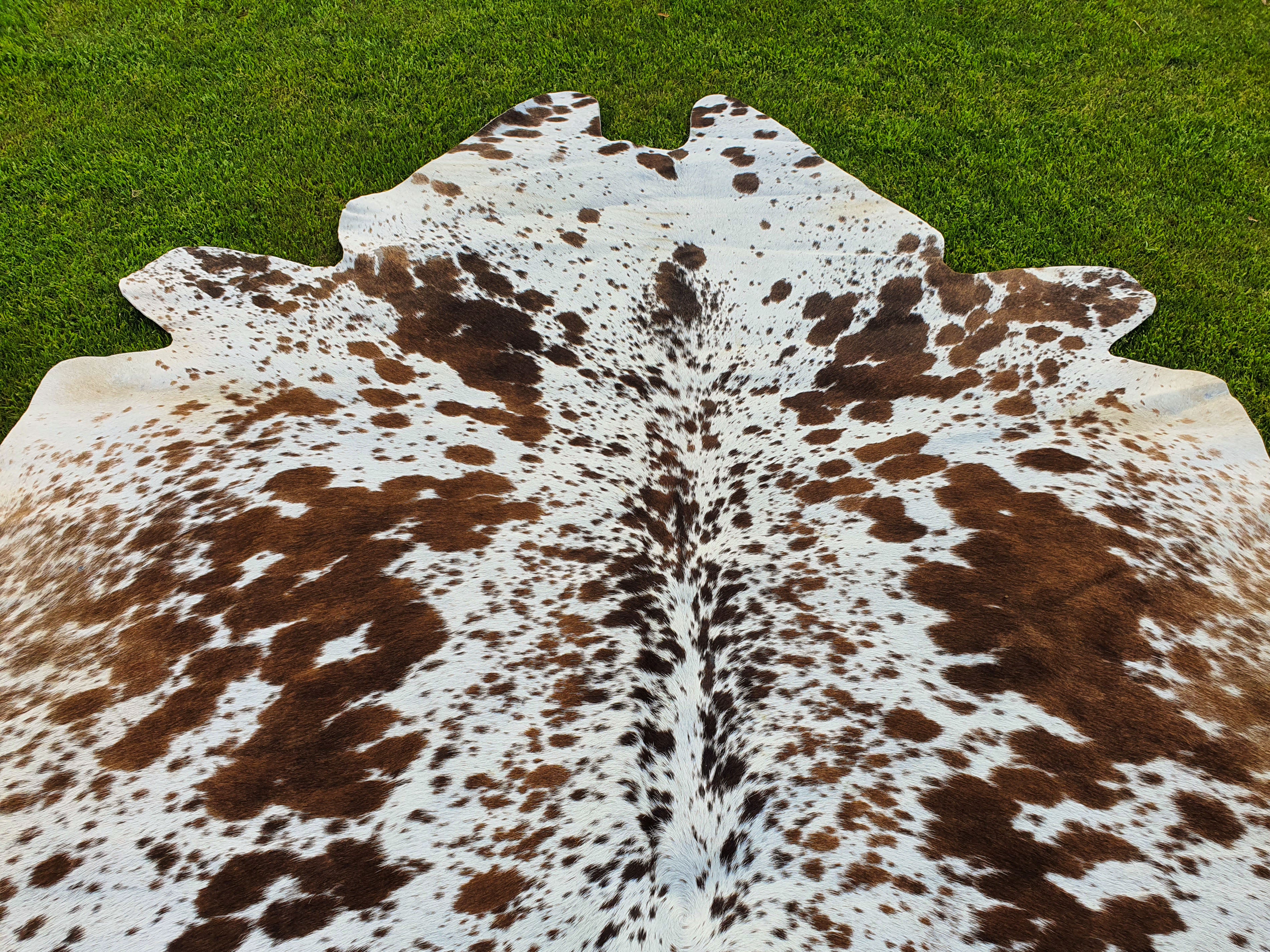 Tan Brown and White Cowhide Rug with Salt and Pepper Print