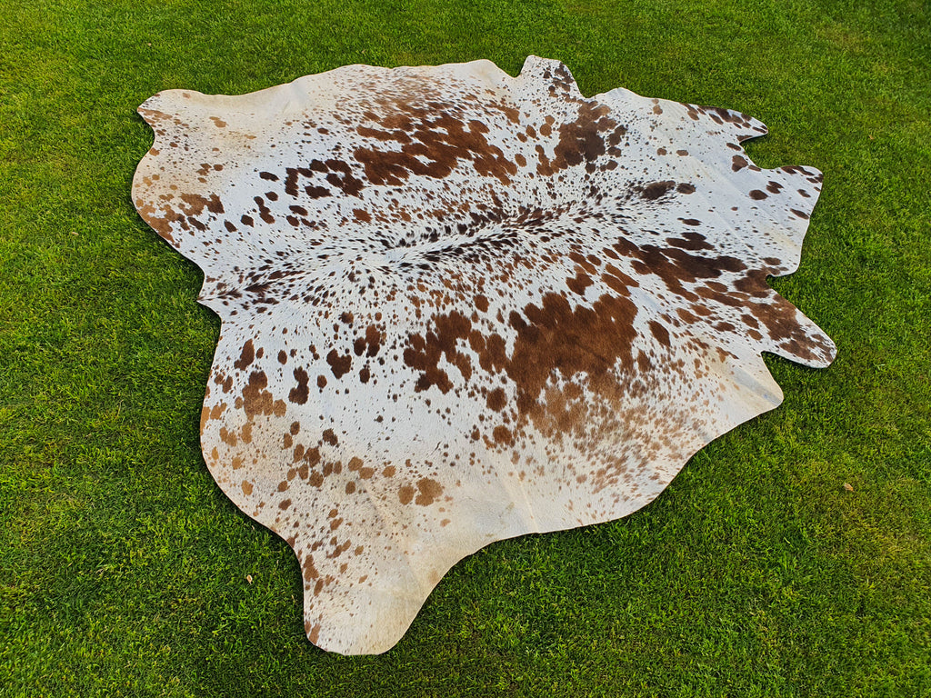 Tan Brown and White Cowhide Rug with Salt and Pepper Print