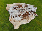 Tan Brown and White Cowhide Rug with Salt and Pepper Print