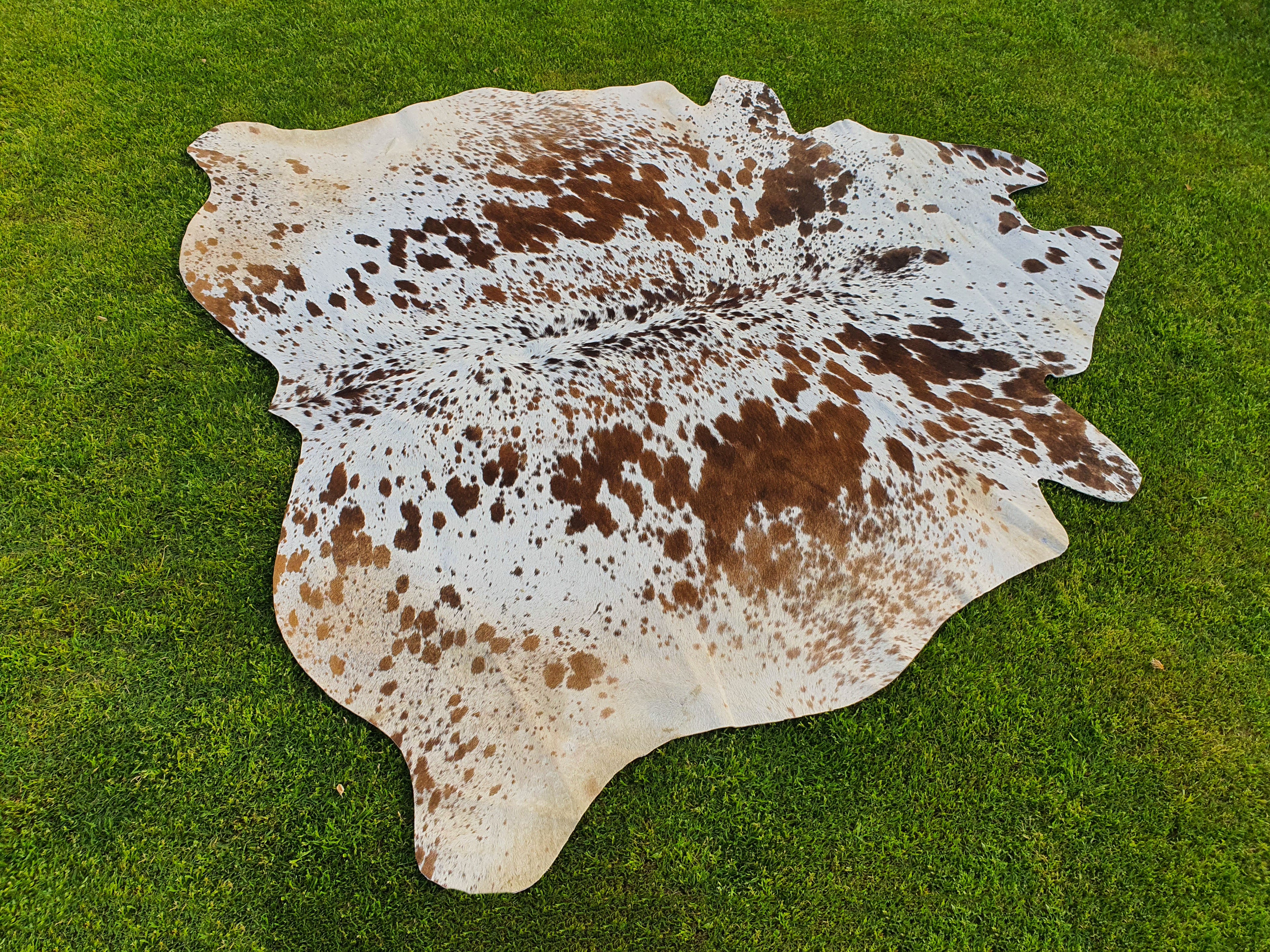 Tan Brown and White Cowhide Rug with Salt and Pepper Print