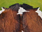 Chocolate Brown and White Tricolor Panda Print Cowhide Rug