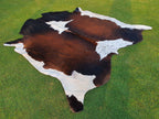 Chocolate Brown and White Tricolor Panda Print Cowhide Rug