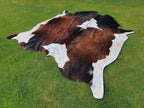 Chocolate Brown and White Tricolor Panda Print Cowhide Rug