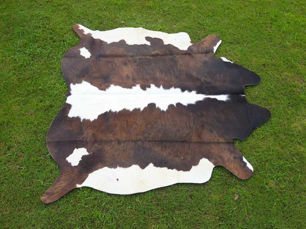 Chocolate Brown and White Hereford Cowhide Rug