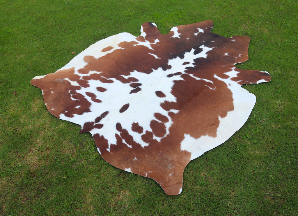 Reddish Brown and White Luxury Hereford Cowhide Rug