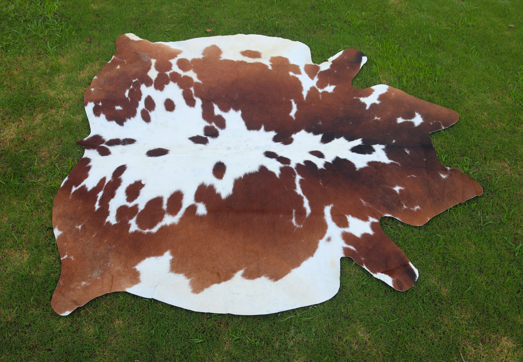 Reddish Brown and White Luxury Hereford Cowhide Rug
