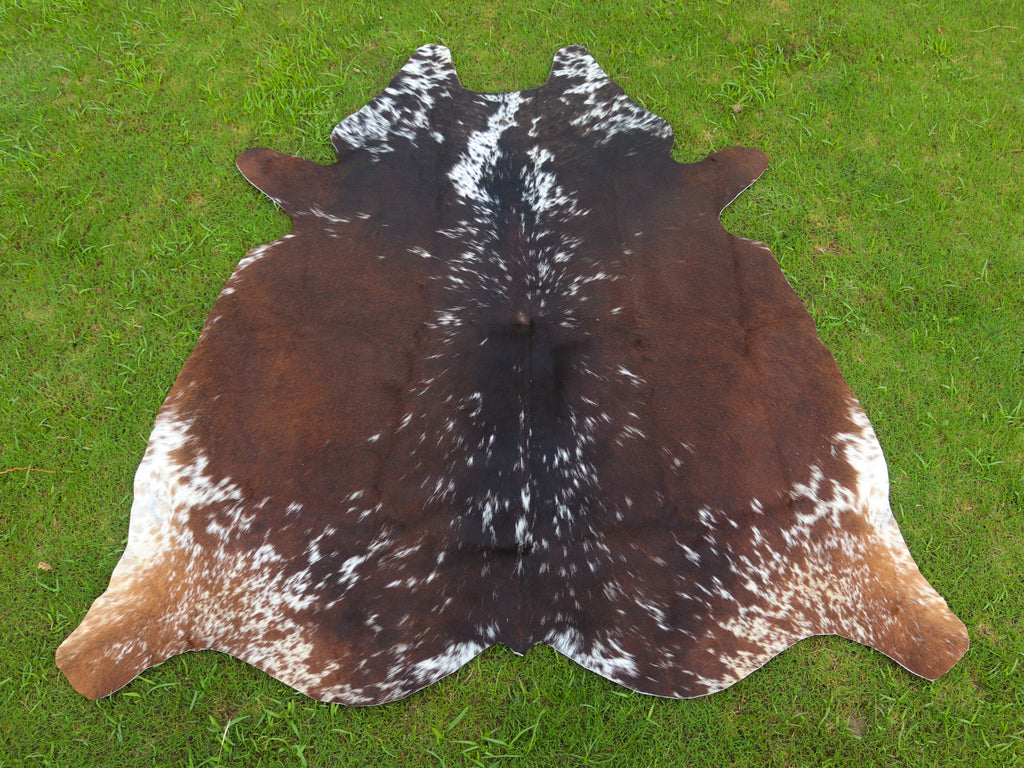 Reddish Brown and White Tricolor Cowhide Rug