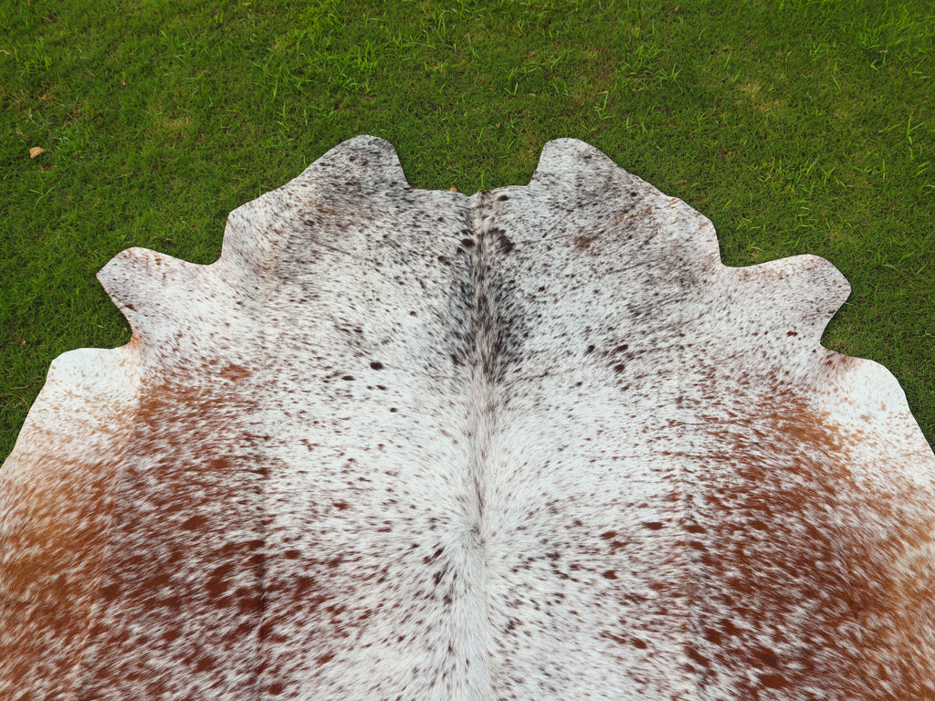 Brown and White Cowhide Rug with Salt and Pepper Print