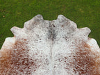 Brown and White Cowhide Rug with Salt and Pepper Print