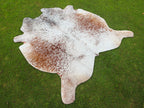 Brown and White Cowhide Rug with Salt and Pepper Print