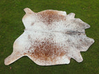 Brown and White Cowhide Rug with Salt and Pepper Print