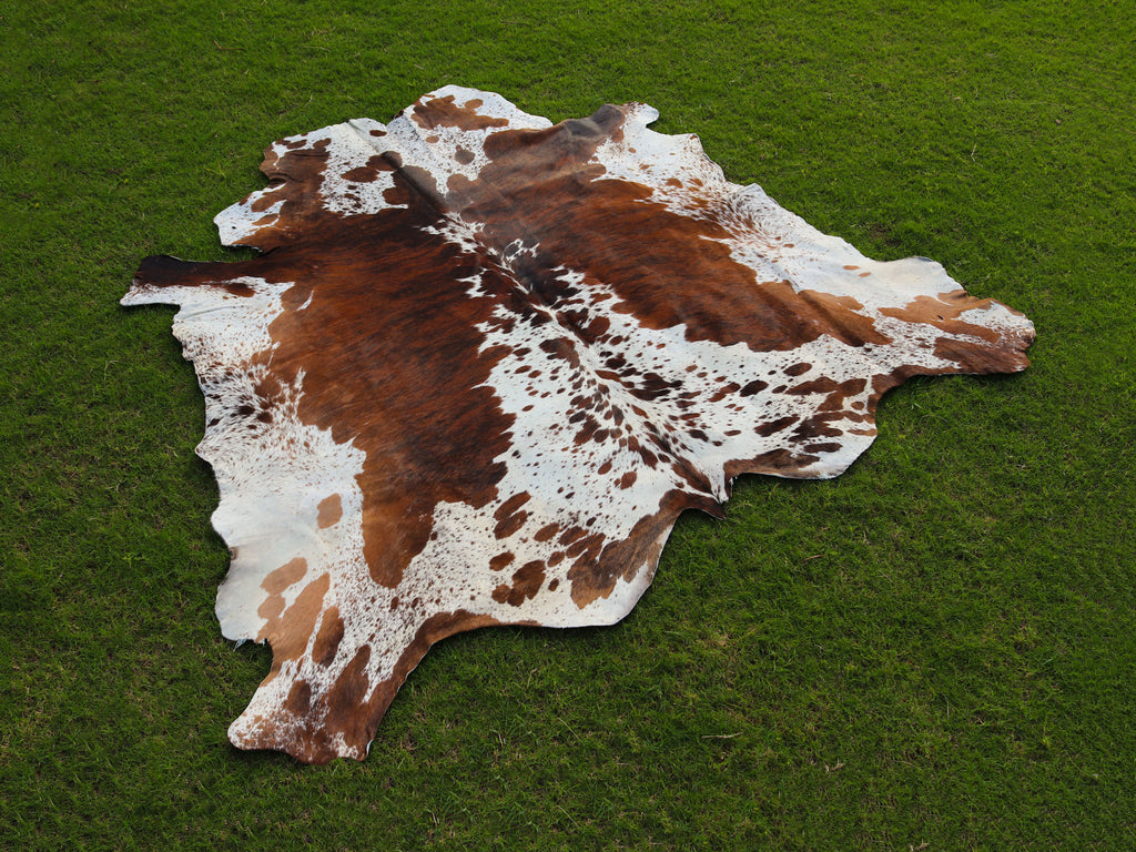 Tricolor Brown and White Brindle Cowhide Rug