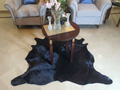 Exclusive Black Cowhide Area Rug