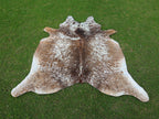Beige and White Tricolor Speckled Cowhide Rug