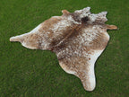 Beige and White Tricolor Speckled Cowhide Rug