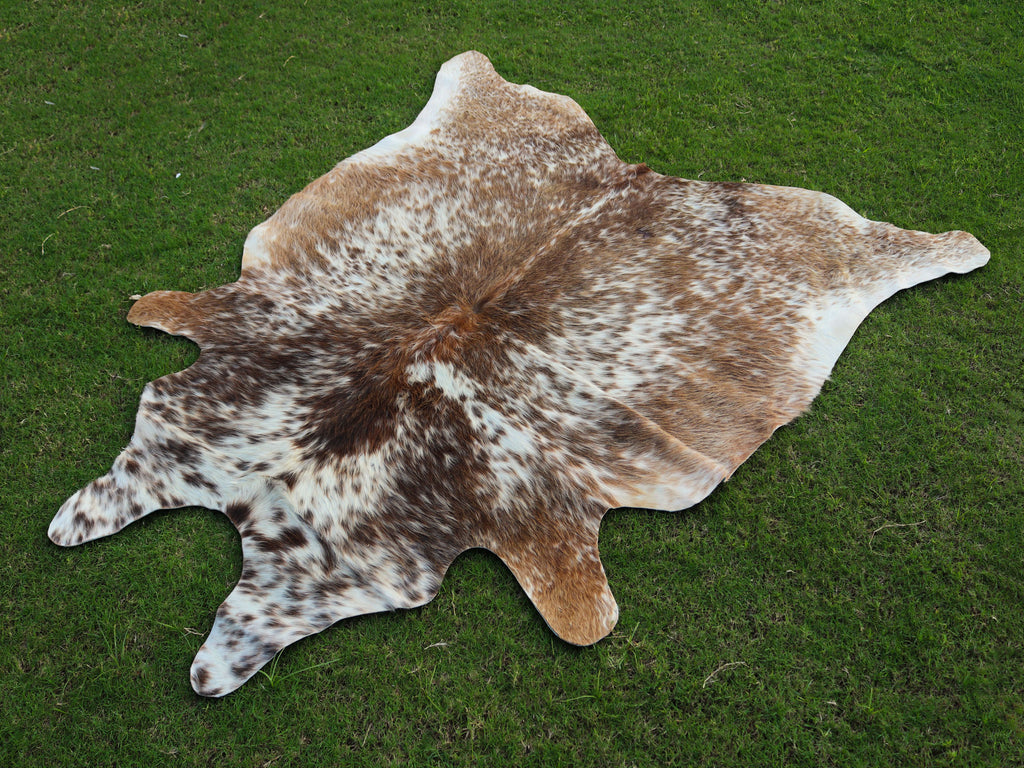 Beige and White Tricolor Speckled Cowhide Rug