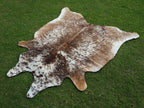 Beige and White Tricolor Speckled Cowhide Rug