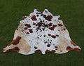 Brown and White Spotted Cowhide Rug