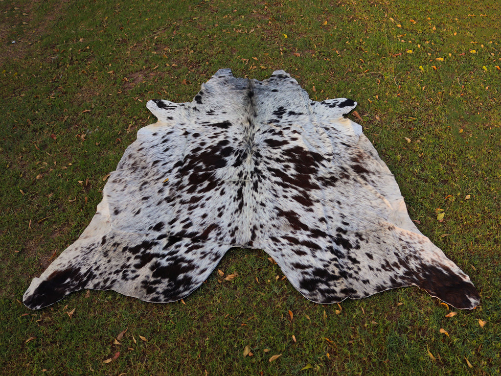 Chocolate Brown and White Cowhide Rug with Salt and Pepper Print