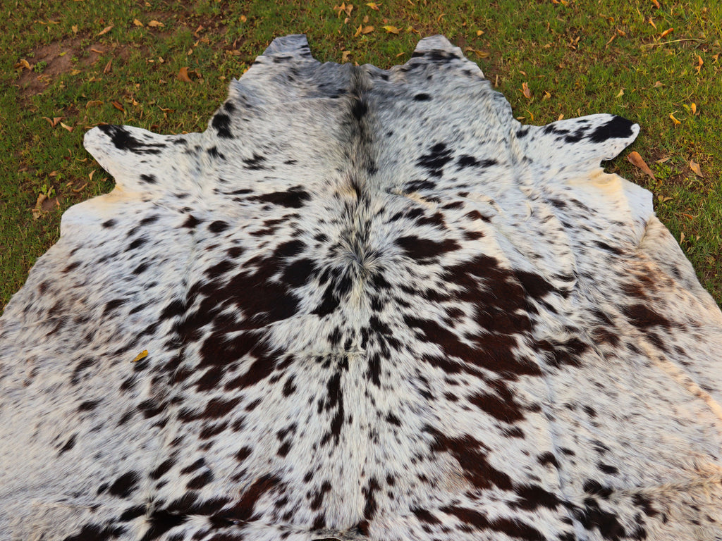 Chocolate Brown and White Cowhide Rug with Salt and Pepper Print