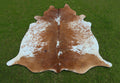 Brown and White Speckled Cowhide Rug
