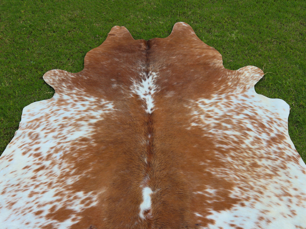 Brown and White Speckled Cowhide Rug