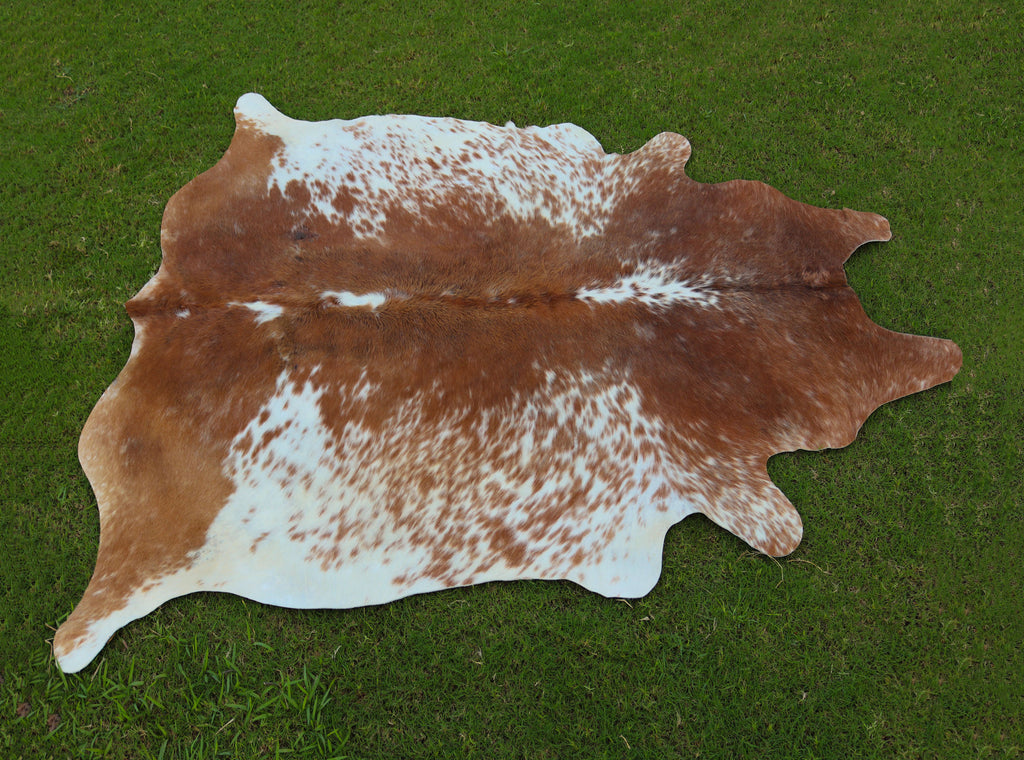 Brown and White Speckled Cowhide Rug