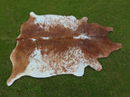 Brown and White Speckled Cowhide Rug