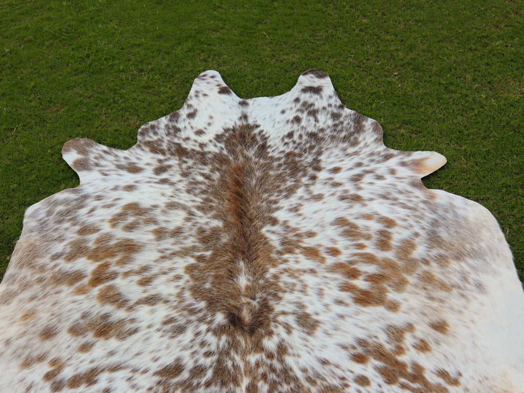 Beige and White Speckled Cowhide Rug