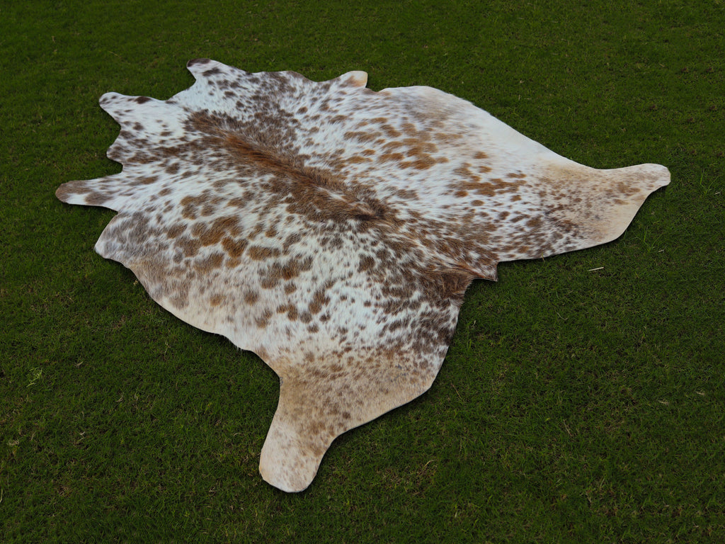 Beige and White Speckled Cowhide Rug