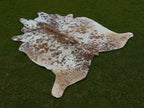 Beige and White Speckled Cowhide Rug