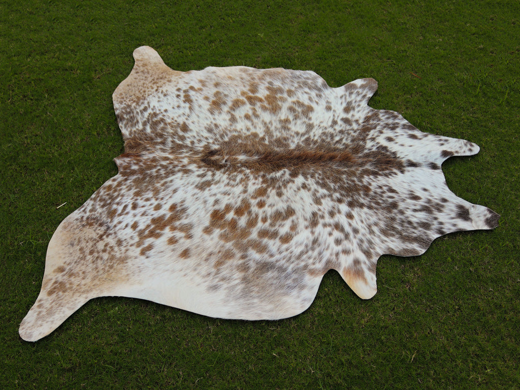 Beige and White Speckled Cowhide Rug