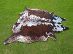 Tricolor Reddish Brown and White Brindle Cowhide Rug