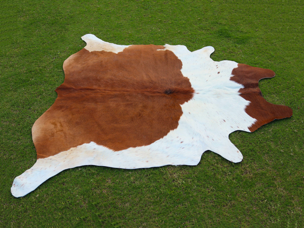 Brown and White Luxury Cowhide Rug in Panda Print Style