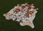 Brown and White Spotted Cowhide Rug for Home Decor