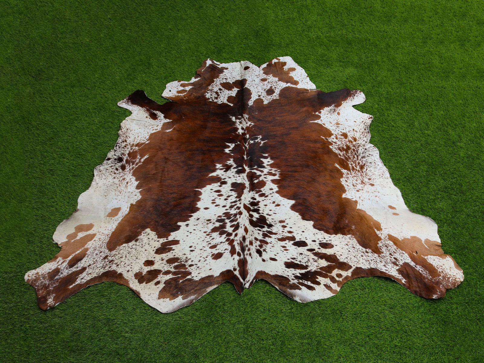 Tricolor Brown and White Brindle Cowhide Rug
