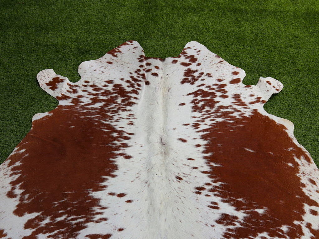 Tan Brown and White Exclusive Cowhide Rug