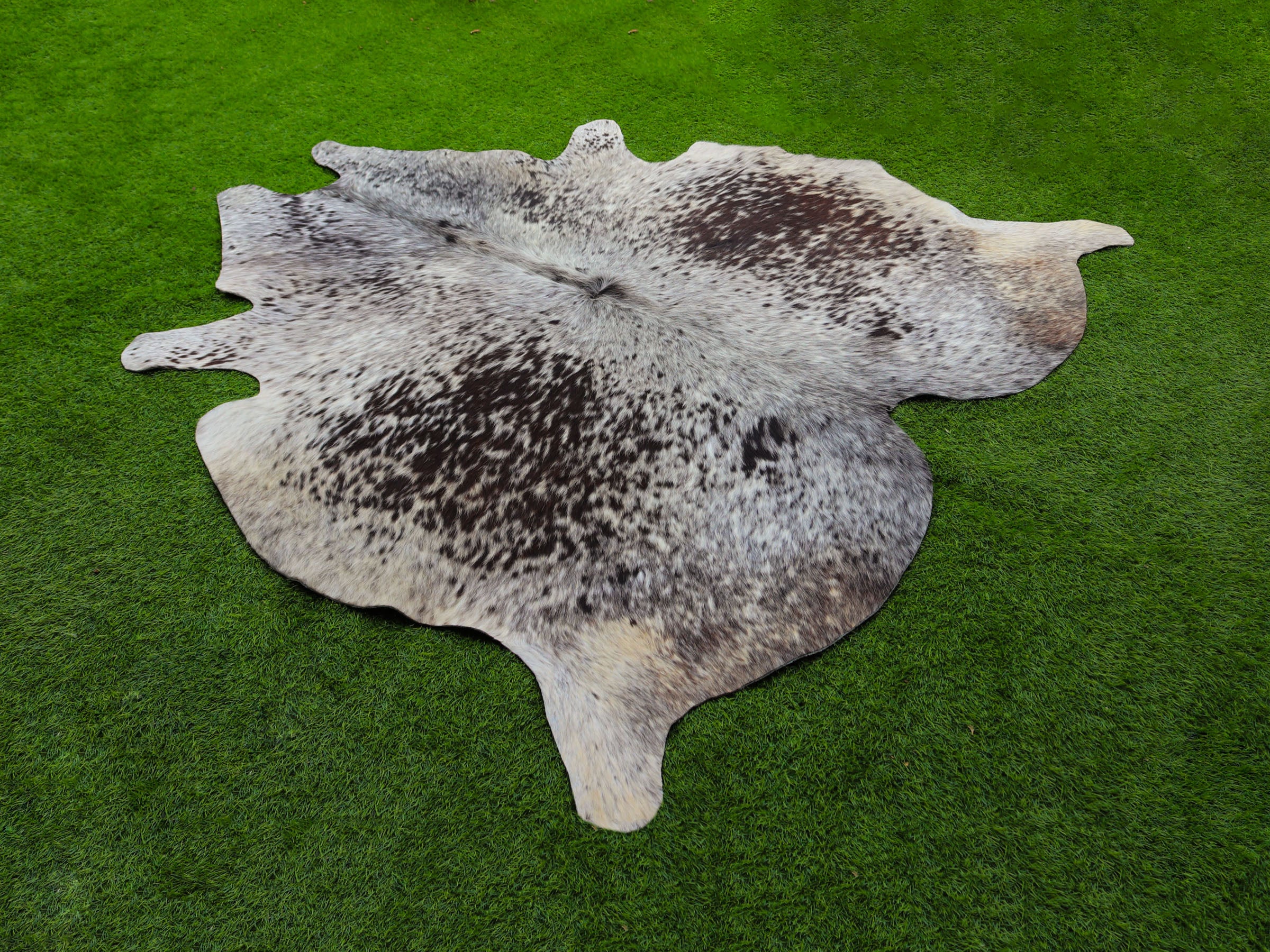Chocolate Brown and White Cowhide Rug in Salt and Pepper Print