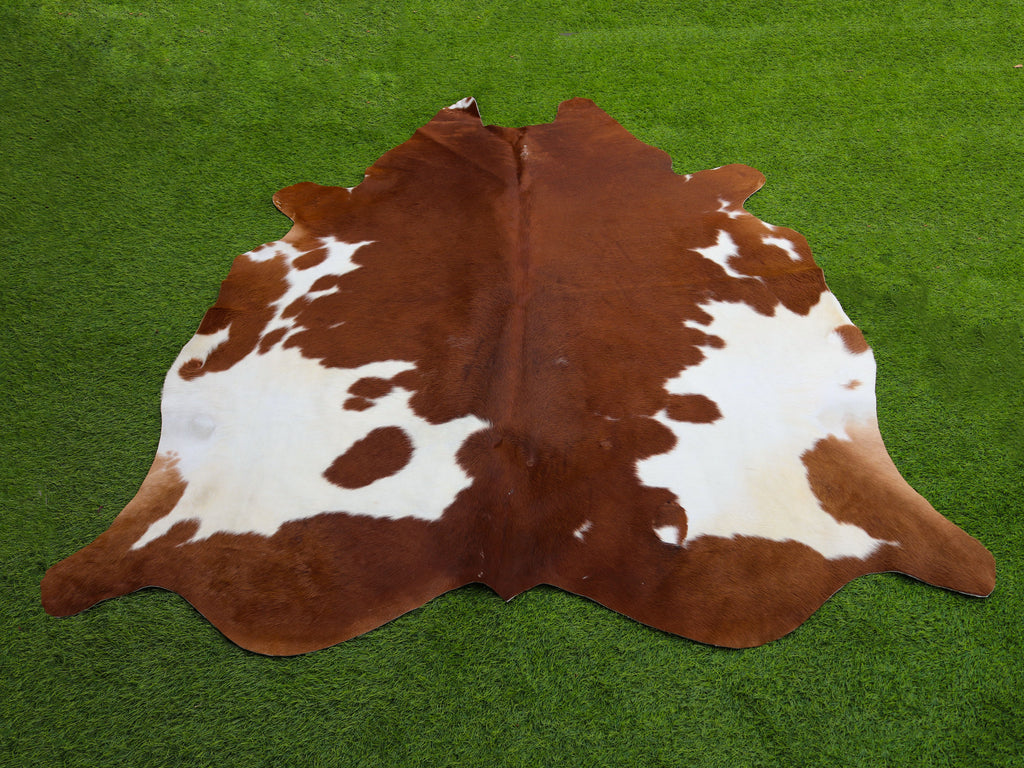 Brown and White Panda Print Cowhide Rug