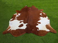 Brown and White Panda Print Cowhide Rug