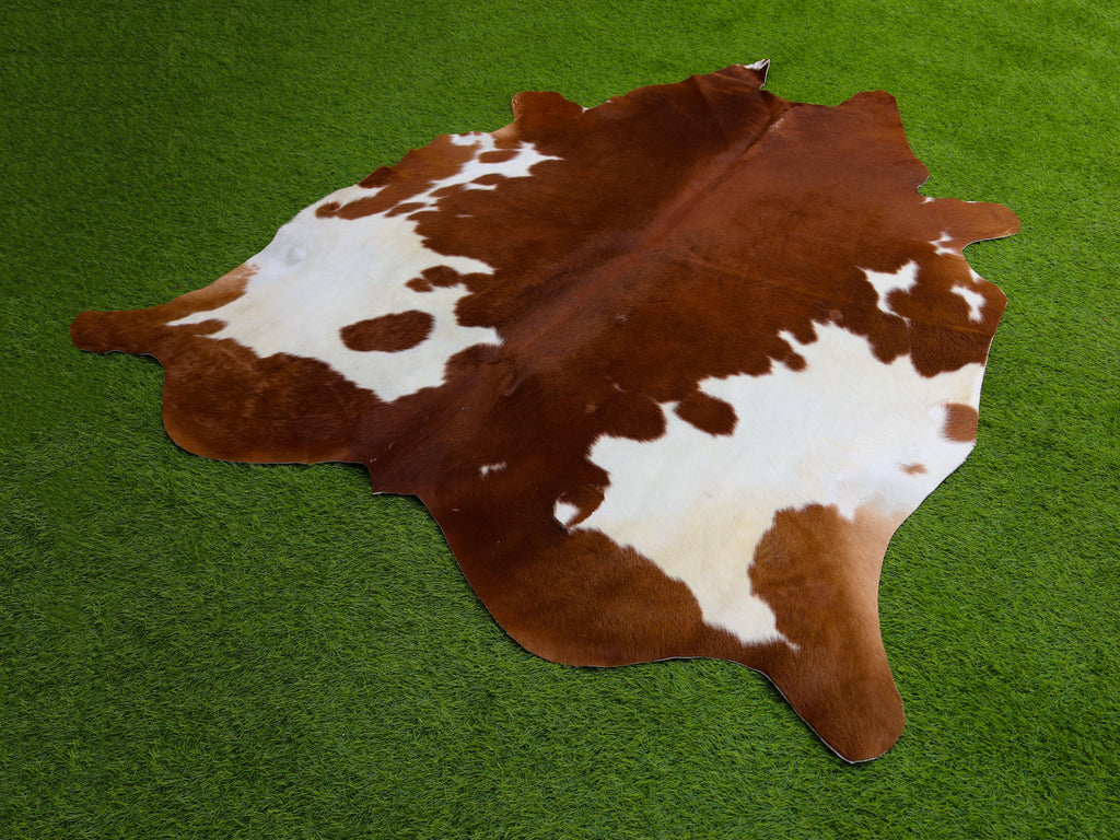 Brown and White Panda Print Cowhide Rug