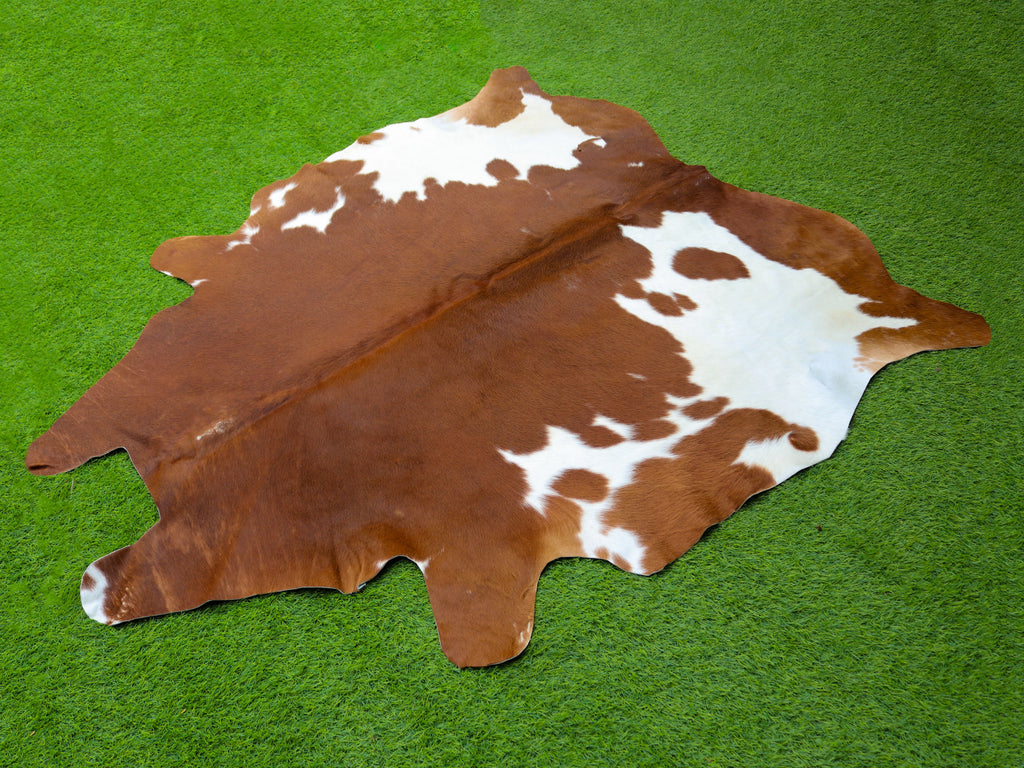 Brown and White Panda Print Cowhide Rug