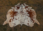 Tan Brown and White Spotted Cowhide Rug for Home Decor
