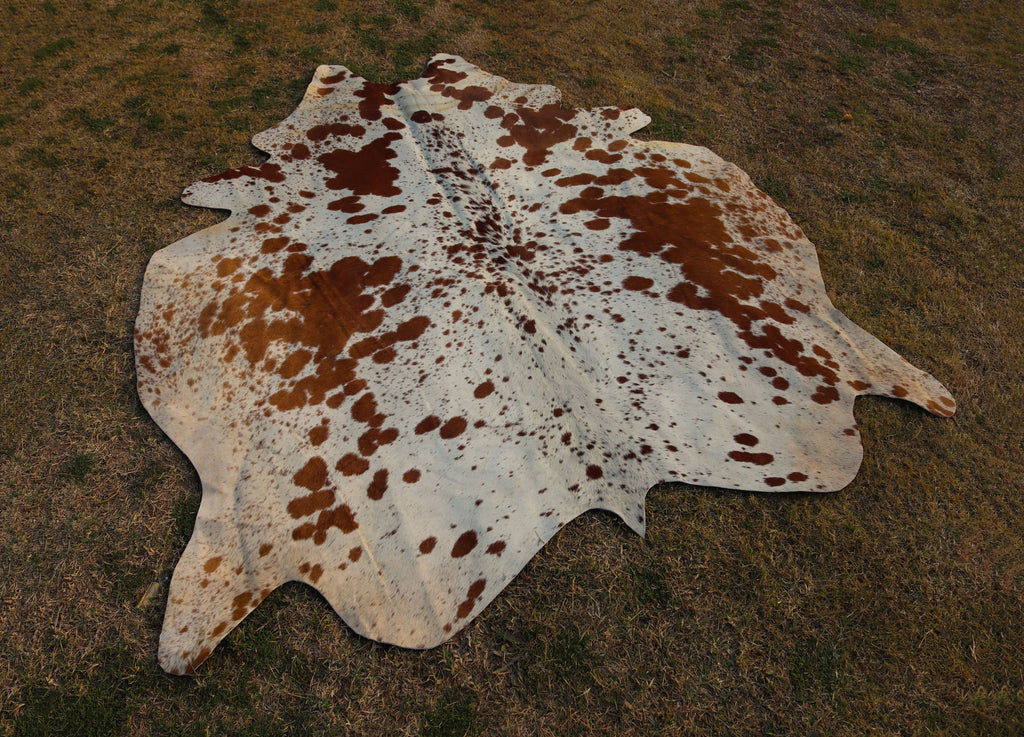 Tan Brown and White Spotted Cowhide Rug for Home Decor