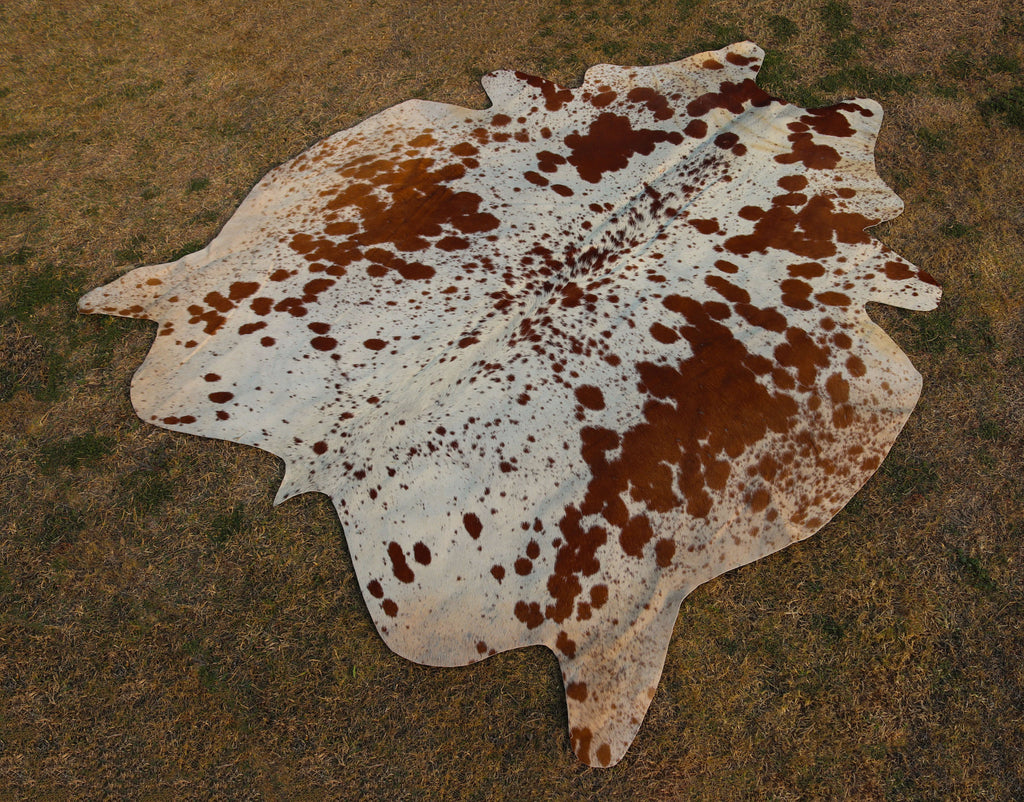 Tan Brown and White Spotted Cowhide Rug for Home Decor