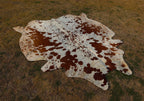 Tan Brown and White Spotted Cowhide Rug for Home Decor