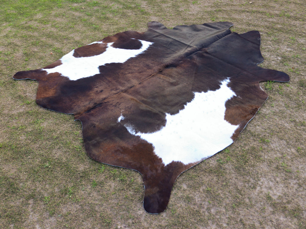 Chocolate Brown and White Cowhide Rug in Panda Print Style