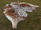 Tan Brown and White Speckled Cowhide Rug