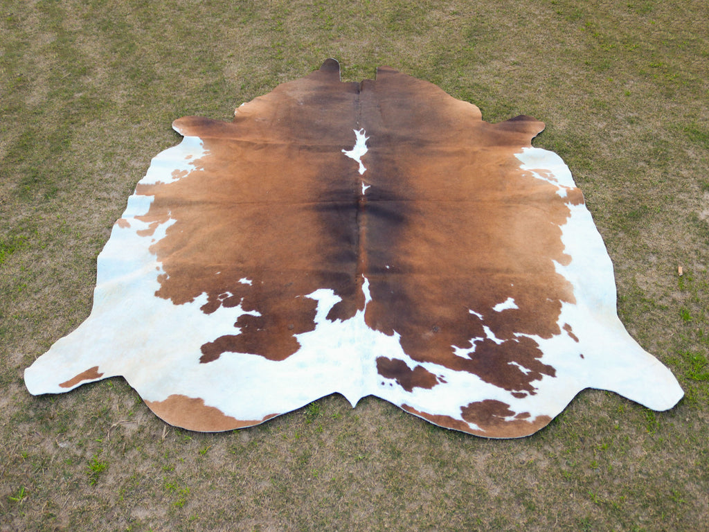 Tan Brown and White Cowhide Rug in Panda Print Style